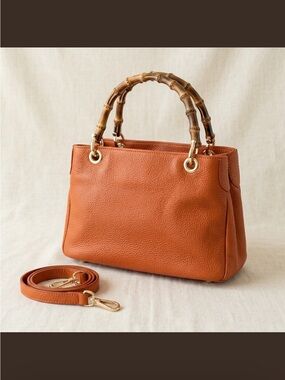 UNO ALLA VOLTA Orange Pebbled Italian Leather Bamboo Handle Satchel Crossbody